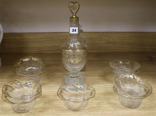 A late 18th century gilt and cut glass decanter and stopper, cut glass flask etc